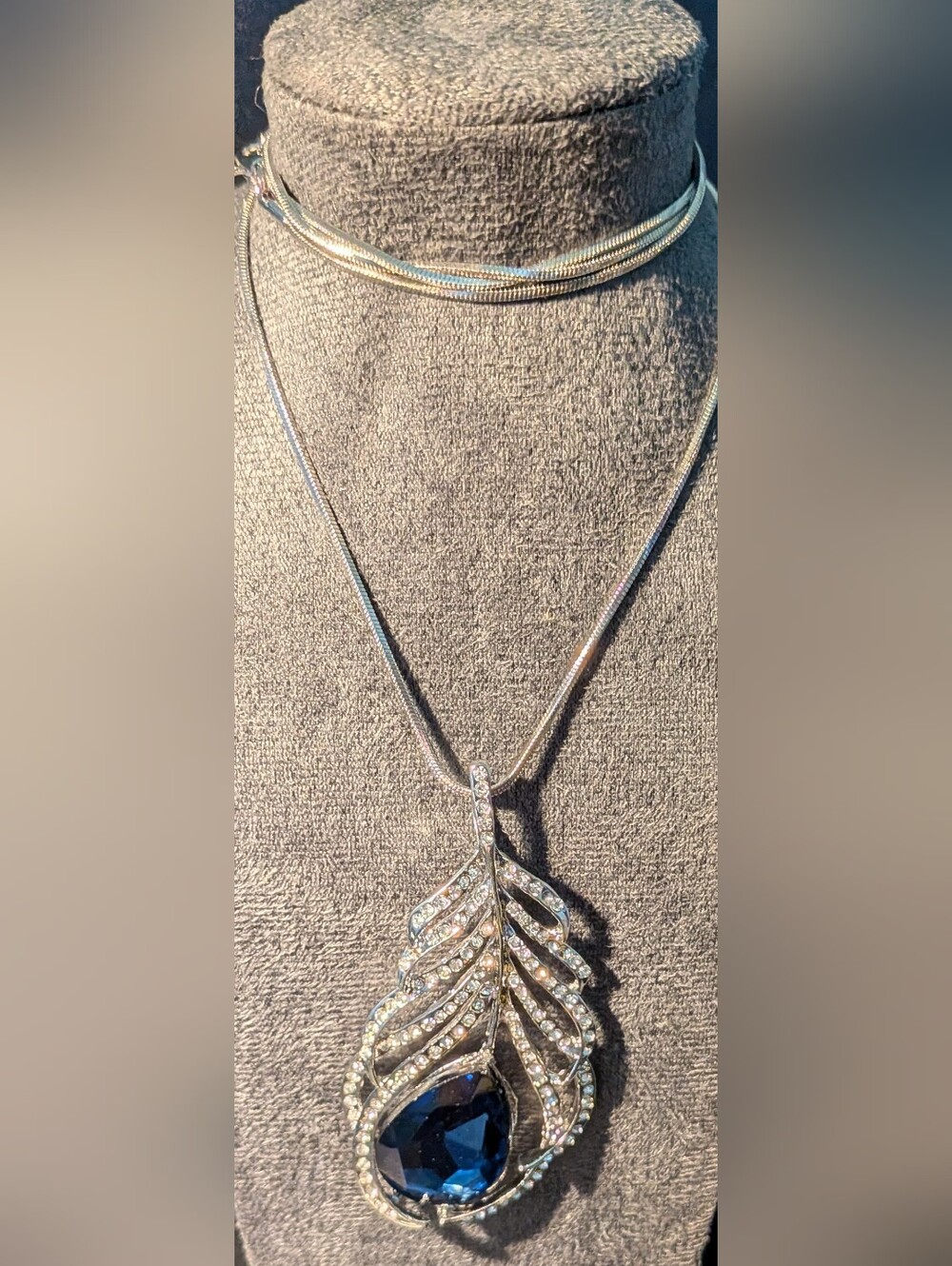 Silver-Tone Leaf Pendant Necklace with Deep Blue Crystal